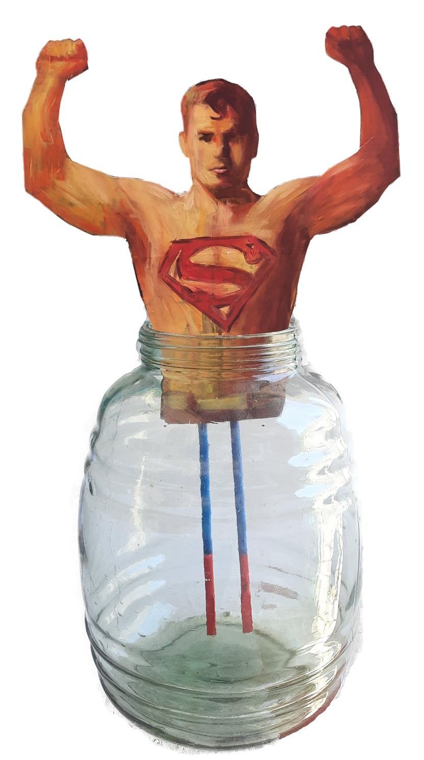 Paper Superman on chopstick legs inside a glass jar